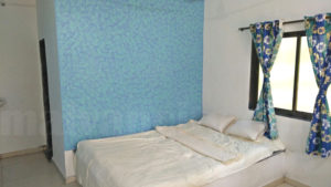 Seashruti Beach resort Image Blue Wall Room